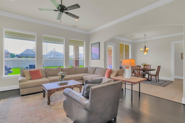2810 Red Maple Dr, Katy, TX 77494 - living area featuring plenty of natural light, a chandelier, crown molding, and baseboards