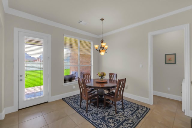 2810 Red Maple Dr, Katy, TX 77494 - dining area featuring light tile patterned floors, a chandelier, baseboards, and ornamental molding