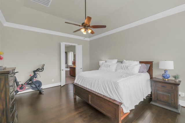 2810 Red Maple Dr, Katy, TX 77494 - bedroom with wood finished floors, ensuite bath, crown molding, ceiling fan, and baseboards