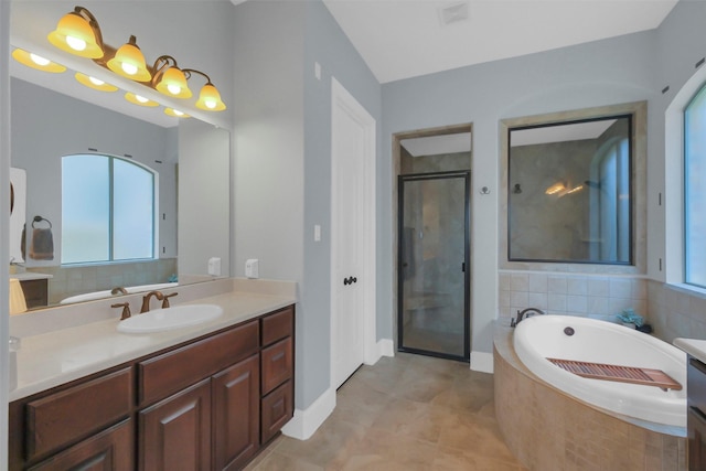 2810 Red Maple Dr, Katy, TX 77494 - bathroom with a shower stall, a garden tub, vanity, and tile patterned flooring