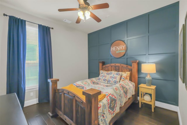 2810 Red Maple Dr, Katy, TX 77494 - bedroom featuring multiple windows, baseboards, dark wood-style flooring, and ceiling fan