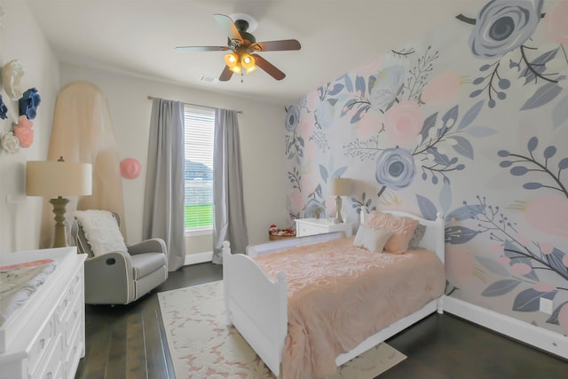 2810 Red Maple Dr, Katy, TX 77494 - bedroom with dark wood-style flooring, a ceiling fan, and baseboards