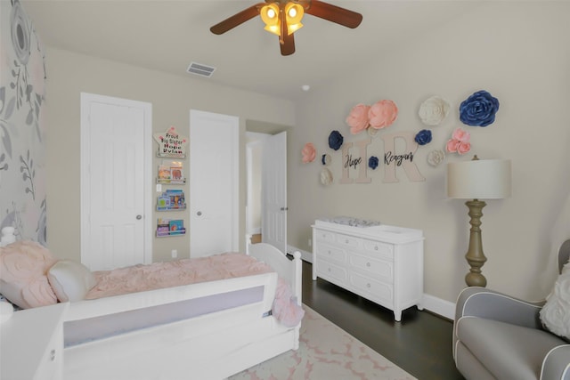 2810 Red Maple Dr, Katy, TX 77494 - bedroom featuring baseboards, a ceiling fan, and dark wood finished floors