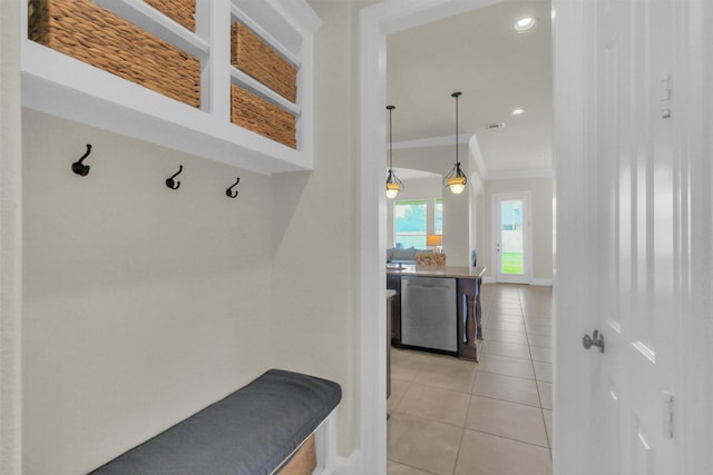 2810 Red Maple Dr, Katy, TX 77494 - mudroom with crown molding, light tile patterned floors, baseboards, and recessed lighting