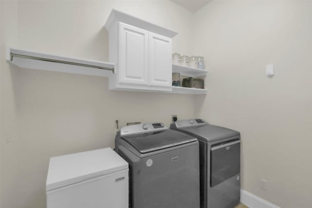 2810 Red Maple Dr, Katy, TX 77494 - washroom with cabinet space and washing machine and dryer