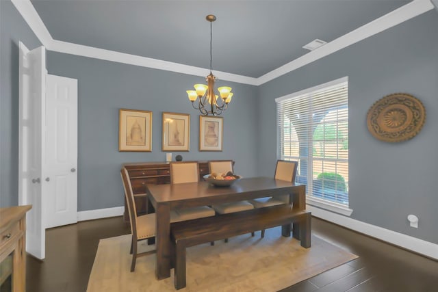 2810 Red Maple Dr, Katy, TX 77494 - dining room with a chandelier, crown molding, baseboards, and wood finished floors