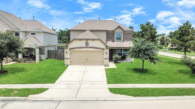 15319 Meandering Post Trl, Houston, TX 77044 - view of front of home with concrete driveway, a garage, and brick siding