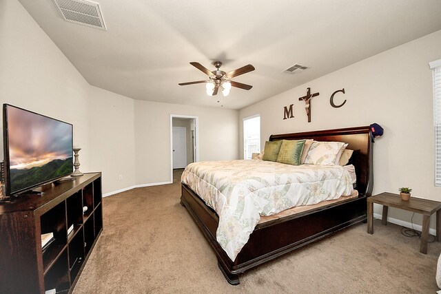 15319 Meandering Post Trl, Houston, TX 77044 - carpeted bedroom with baseboards and ceiling fan