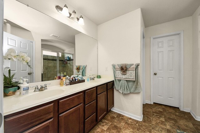 15319 Meandering Post Trl, Houston, TX 77044 - bathroom with double vanity, baseboards, and a stall shower