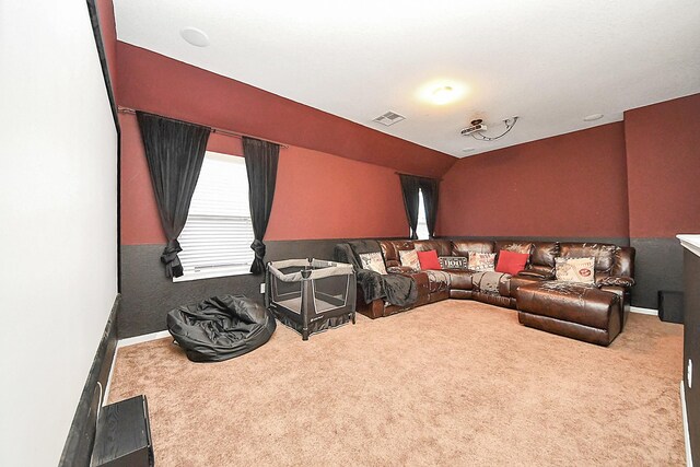 15319 Meandering Post Trl, Houston, TX 77044 - carpeted living room featuring baseboards and vaulted ceiling