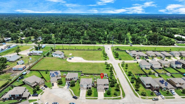 15319 Meandering Post Trl, Houston, TX 77044 - aerial view of residential area featuring a forest
