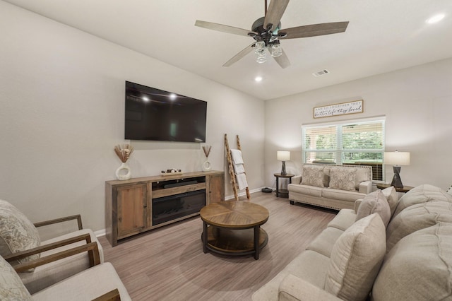 26410 Yaupon Crk, Magnolia, TX 77355 - living area with baseboards, light wood-style flooring, ceiling fan, and recessed lighting