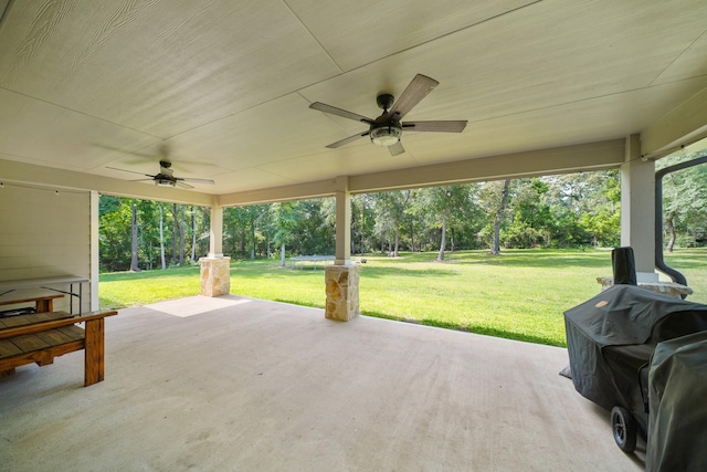26410 Yaupon Crk, Magnolia, TX 77355 - view of patio / terrace with a ceiling fan and view of scattered trees