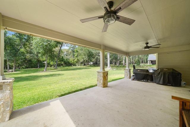 26410 Yaupon Crk, Magnolia, TX 77355 - view of patio featuring ceiling fan, area for grilling, and view of scattered trees