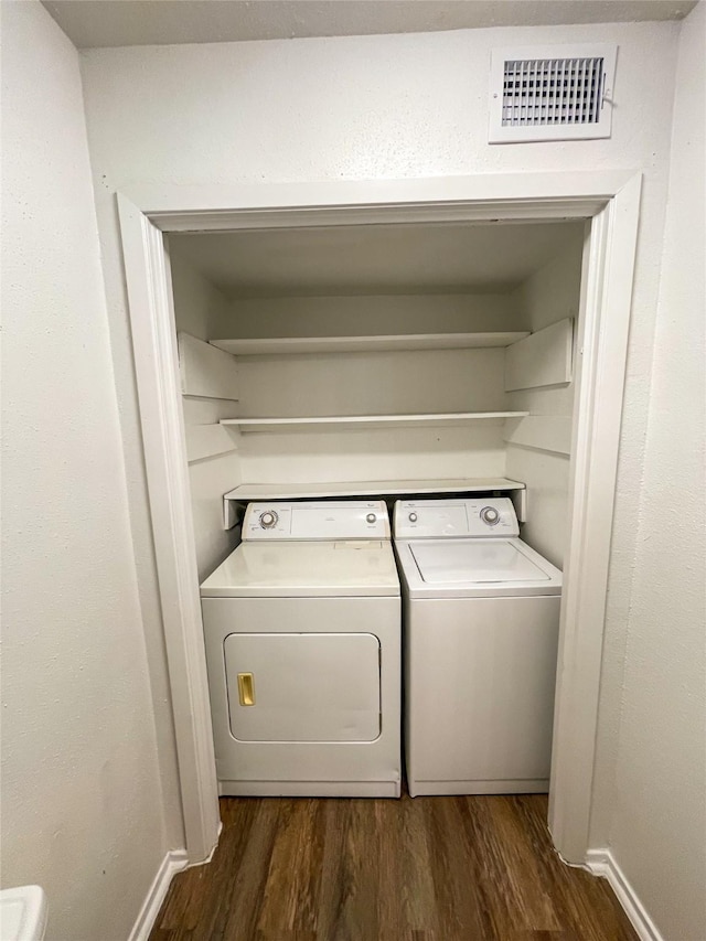 10555 Turtlewood Ct Unit 610, Houston, TX 77072 - laundry area featuring separate washer and dryer and dark wood finished floors
