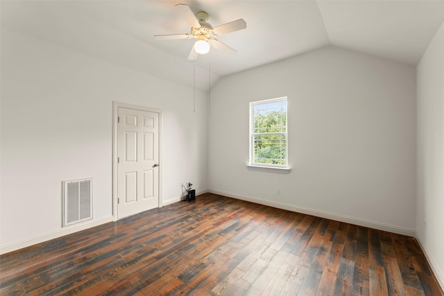 4015 Garrott St, Houston, TX 77006 - empty room with dark wood finished floors, ceiling fan, vaulted ceiling, and baseboards