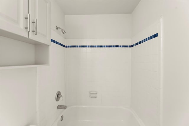 4015 Garrott St, Houston, TX 77006 - bathroom featuring bathing tub / shower combination