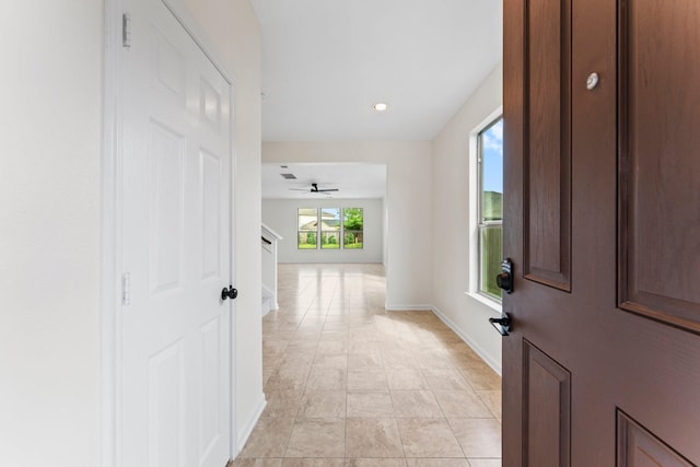 835 Sandford Lodge Dr, Houston, TX 77073 - foyer entrance with a ceiling fan, baseboards, and light tile patterned flooring