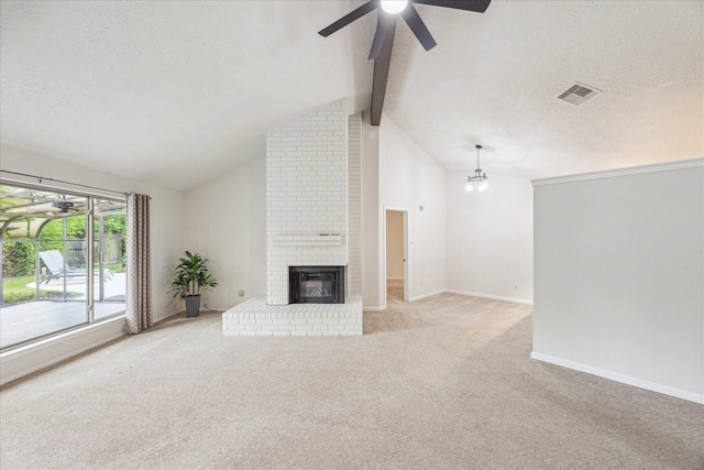 1018 W Castlewood Ave, Friendswood, TX 77546 - unfurnished living room featuring a fireplace, ceiling fan, carpet floors, baseboards, and a textured ceiling