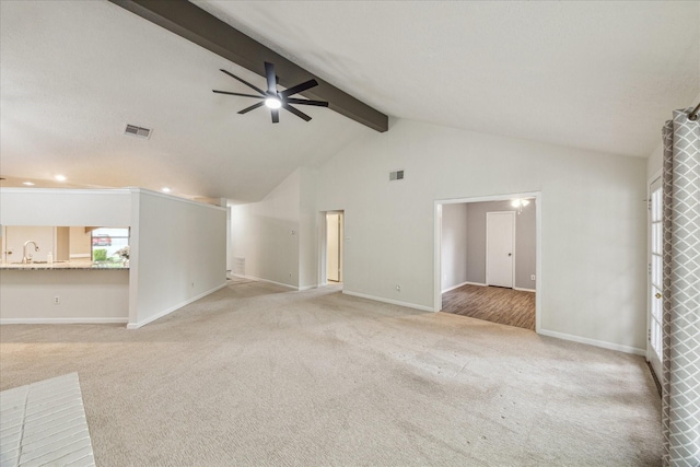 1018 W Castlewood Ave, Friendswood, TX 77546 - unfurnished living room with a ceiling fan, light carpet, baseboards, a sink, and recessed lighting