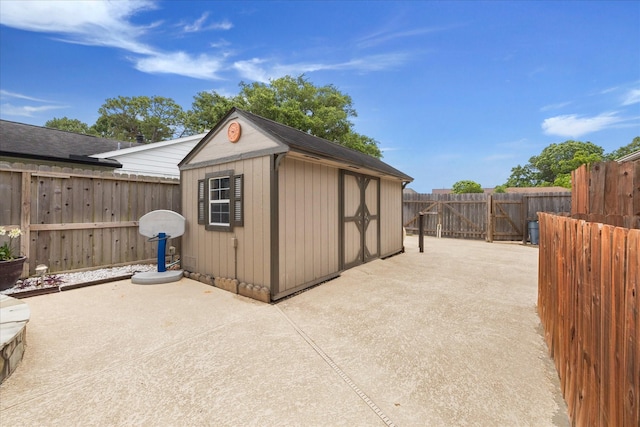 1018 W Castlewood Ave, Friendswood, TX 77546 - view of shed with a fenced backyard and a gate
