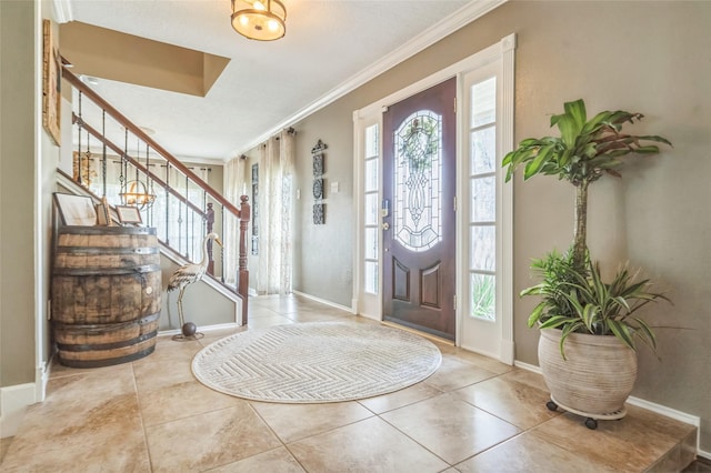 1914 Tipperary Dr, Deer Park, TX 77536 - foyer with stairs, ornamental molding, tile patterned flooring, and baseboards
