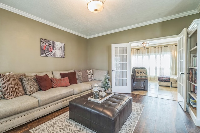 1914 Tipperary Dr, Deer Park, TX 77536 - living room with crown molding, wood-type flooring, and a textured ceiling