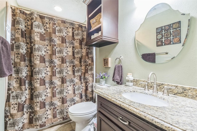 1914 Tipperary Dr, Deer Park, TX 77536 - bathroom with vanity, toilet, curtained shower, and a textured ceiling