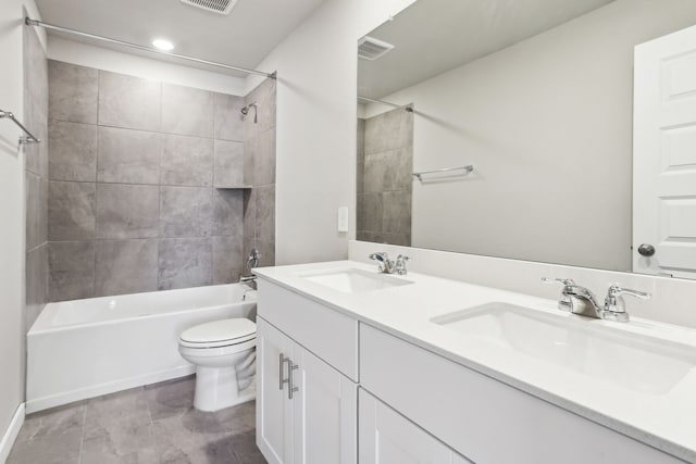 18737 Bliss Pl, New Caney, TX 77357 - bathroom featuring toilet, double vanity, shower / tub combination, and recessed lighting