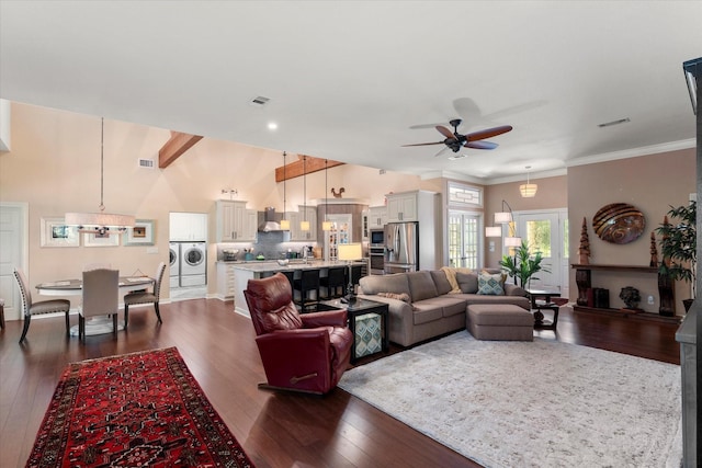 181 Saint Andrews Dr, Mabank, TX 75156 - living area with washing machine and dryer, ceiling fan, dark wood-type flooring, and ornamental molding