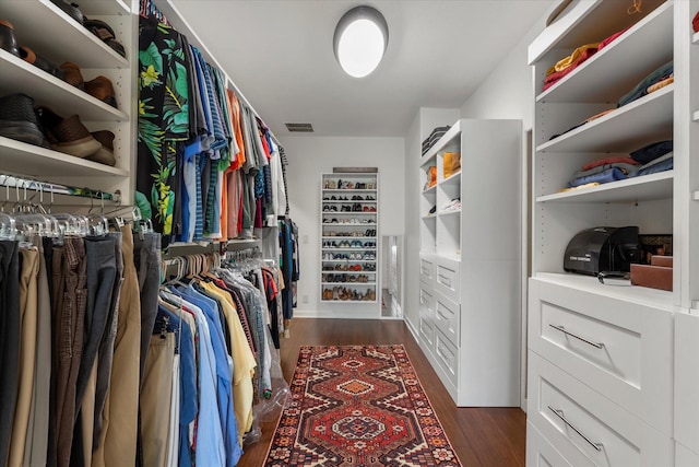 181 Saint Andrews Dr, Mabank, TX 75156 - walk in closet with dark wood-type flooring