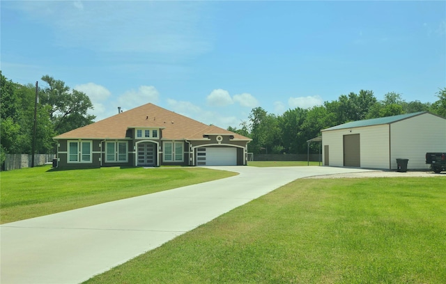 807 Steele Rd Unit A, Highlands, TX 77562 - view of front facade featuring concrete driveway and an outdoor structure