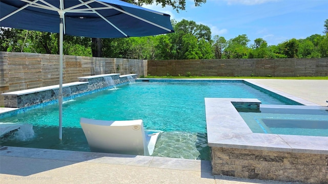 807 Steele Rd Unit A, Highlands, TX 77562 - view of pool with a fenced backyard and an in-ground hot tub