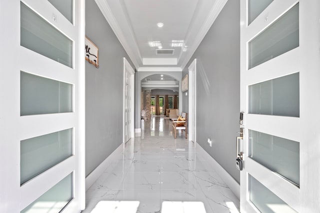 807 Steele Rd Unit A, Highlands, TX 77562 - corridor with arched walkways, french doors, baseboards, marble tiled floors, and crown molding