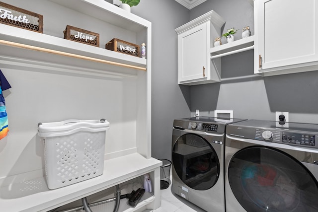 807 Steele Rd Unit A, Highlands, TX 77562 - washroom with cabinet space, washing machine and dryer, light marble finish floors, and ornamental molding