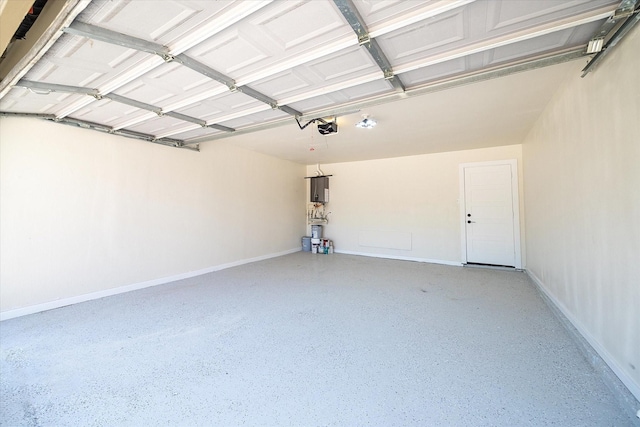 10830 Bob White Dr, Houston, TX 77096 - garage with a garage door opener and baseboards