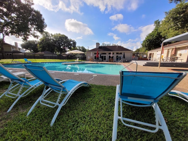 10830 Bob White Dr, Houston, TX 77096 - community pool featuring a fenced backyard and a patio area