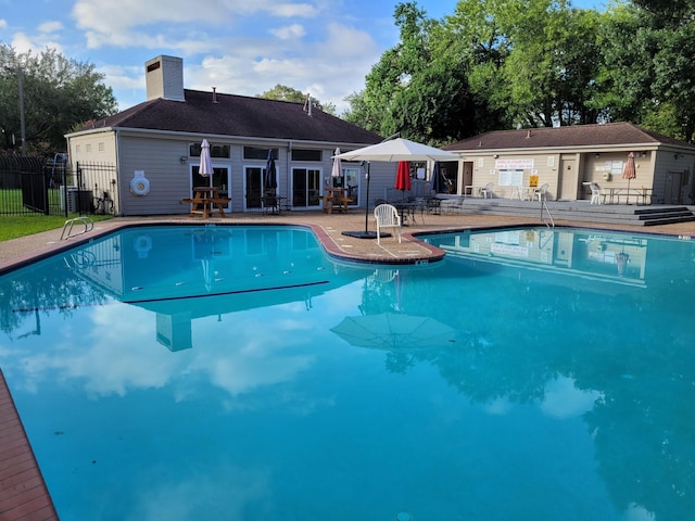 10830 Bob White Dr, Houston, TX 77096 - community pool featuring a patio