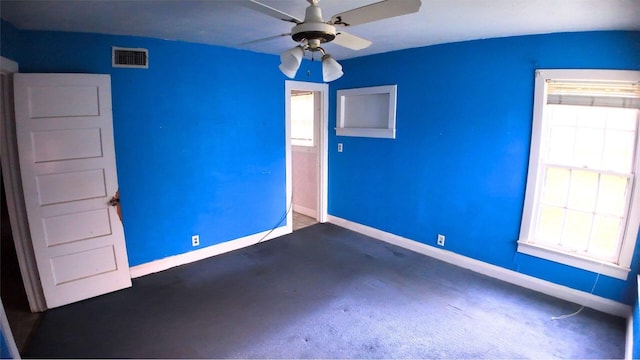 4145 Chaison St, Beaumont, TX 77705 - unfurnished room with carpet, baseboards, and ceiling fan