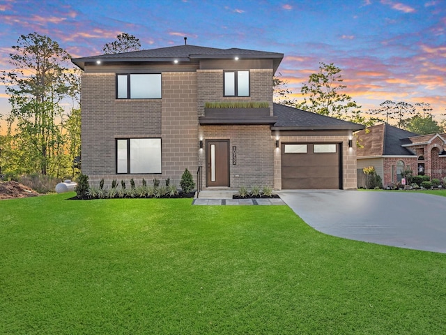 10732 Twin Oaks Dr, Conroe, TX 77385 - modern home with driveway, brick siding, a yard, and a garage