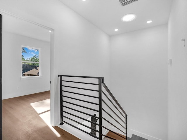 10732 Twin Oaks Dr, Conroe, TX 77385 - stairway featuring wood finished floors and recessed lighting