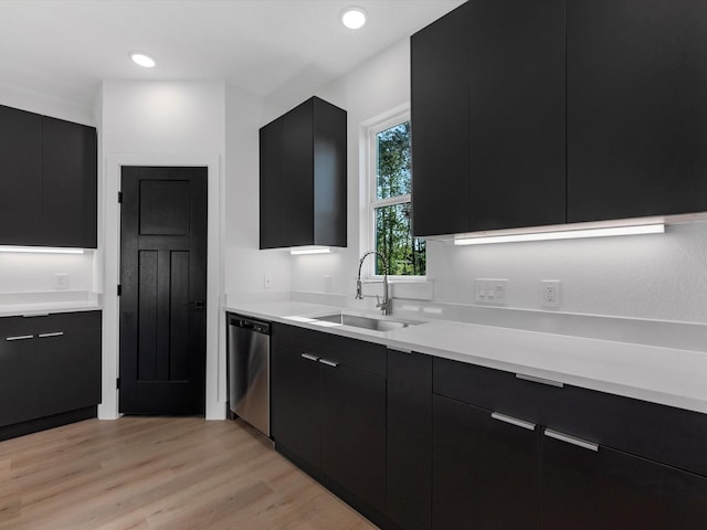 10732 Twin Oaks Dr, Conroe, TX 77385 - kitchen with dishwasher, a sink, dark cabinets, modern cabinets, and recessed lighting