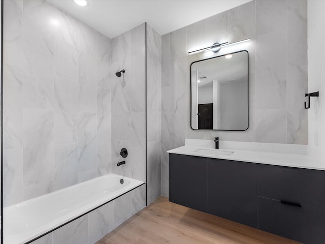 10732 Twin Oaks Dr, Conroe, TX 77385 - bathroom with vanity,  shower combination, and wood finished floors
