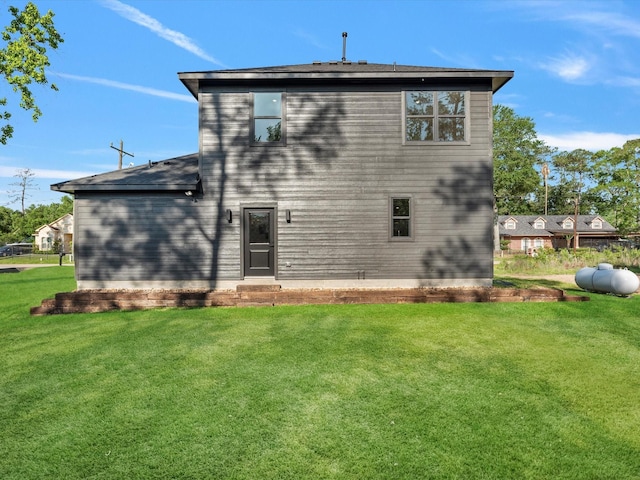 10732 Twin Oaks Dr, Conroe, TX 77385 - back of house with a yard
