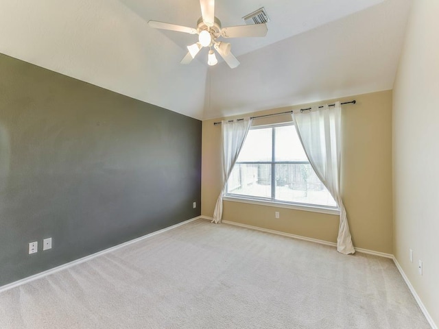 24247 Silversmith Ln, Katy, TX 77493 - carpeted spare room featuring vaulted ceiling, a ceiling fan, and baseboards