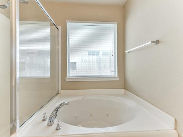 24247 Silversmith Ln, Katy, TX 77493 - bathroom featuring a jetted tub