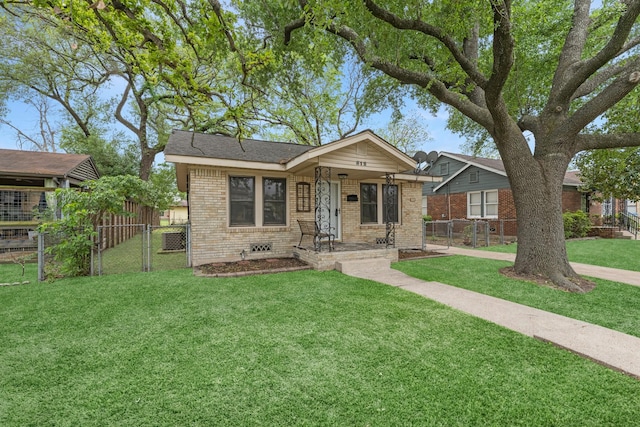 512 Gale St, Houston, TX 77009 - bungalow with brick siding, a gate, and covered porch