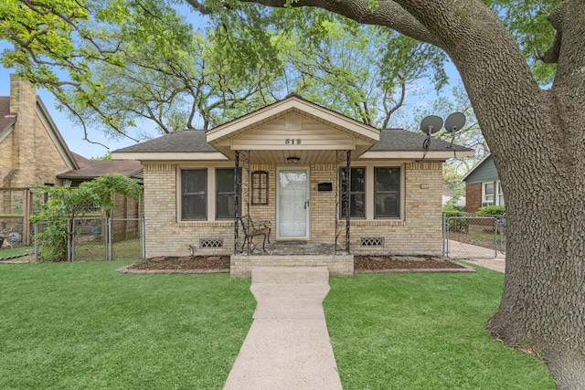 512 Gale St, Houston, TX 77009 - bungalow-style house featuring a gate, brick siding, and a shingled roof