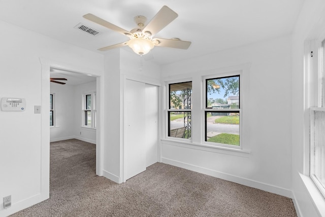 512 Gale St, Houston, TX 77009 - unfurnished room featuring light carpet, a ceiling fan, and baseboards