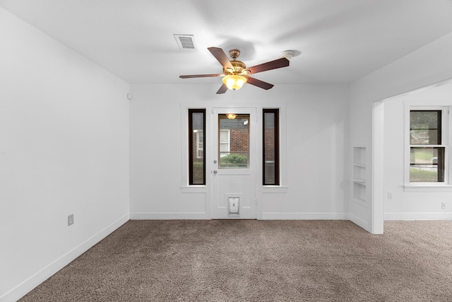 512 Gale St, Houston, TX 77009 - unfurnished room featuring carpet flooring, ceiling fan, and baseboards